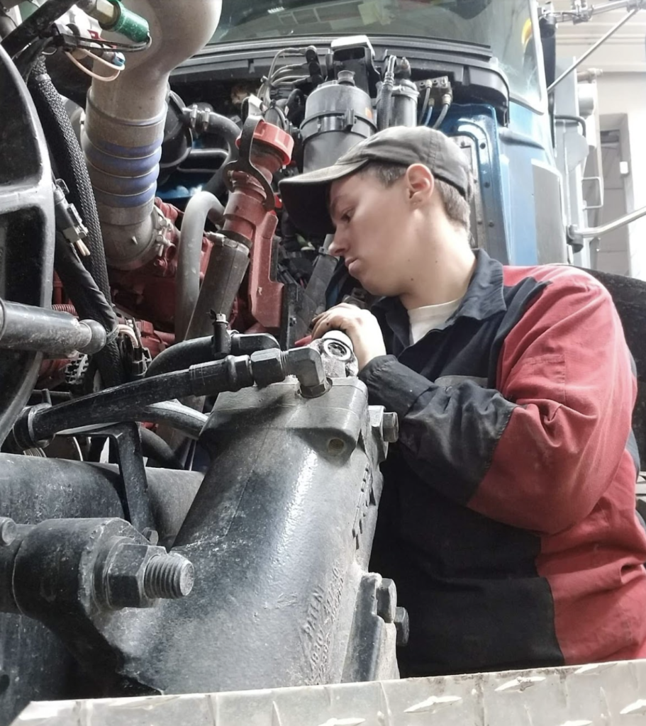 Wrenching Women Wednesday with Katie French, featuring Laina Stashek, Diesel Technician for Truck Country of McCoy Group in Wisconsin.
