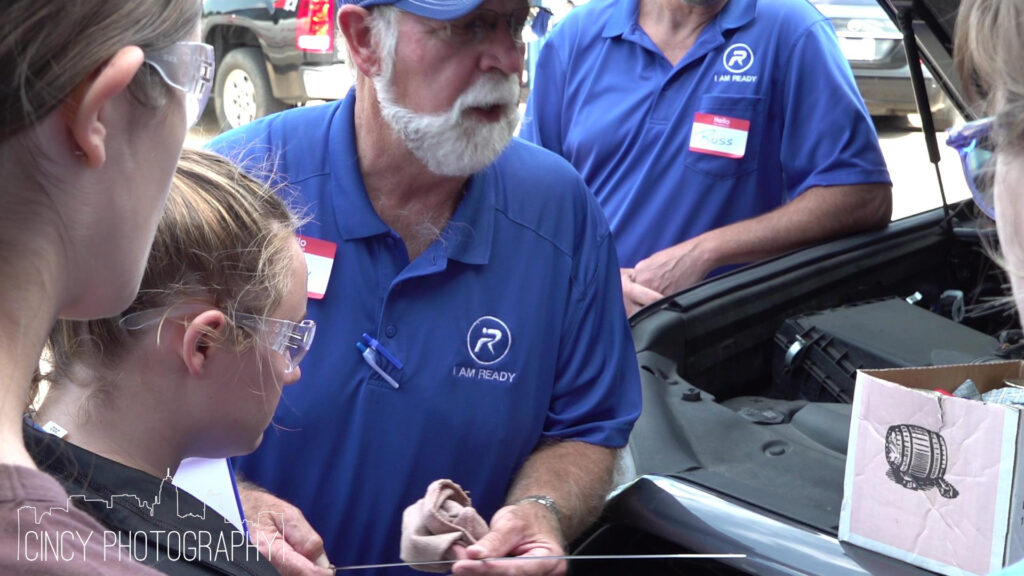 Ulmer's Auto Care Center in Ohio hosts several workshops every year, including "Am I ready?" for teens to learn more about vehicle maintenance including how to change a tire, check engine oil, tire pressure, and what to do in an emergency. Photo Credits: Cincy Photography